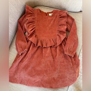 Pretty long sleeve and ruffle dress for a romantic look. (Size 4)